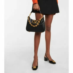 Valentino Garavani Maxi Stud Patent Leather Slingback Pumps -Valentino Garavani Sales unnamed file 1872